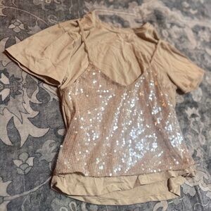Shimmer in style with this elegant sequin beige top. Perfect for a night out or